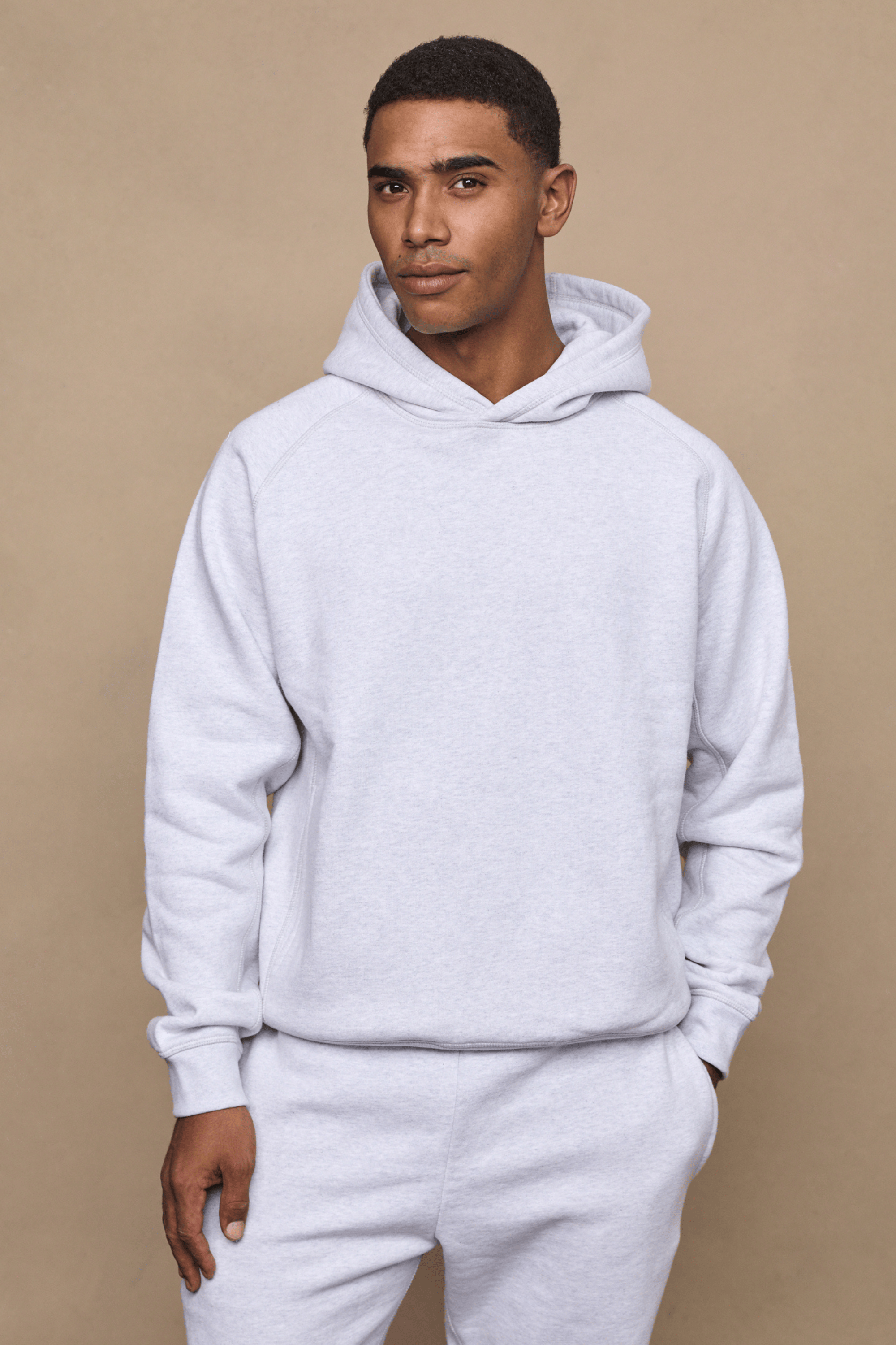 Men’s heavyweight cotton blend hoodie in grey with raglan sleeves by Raith