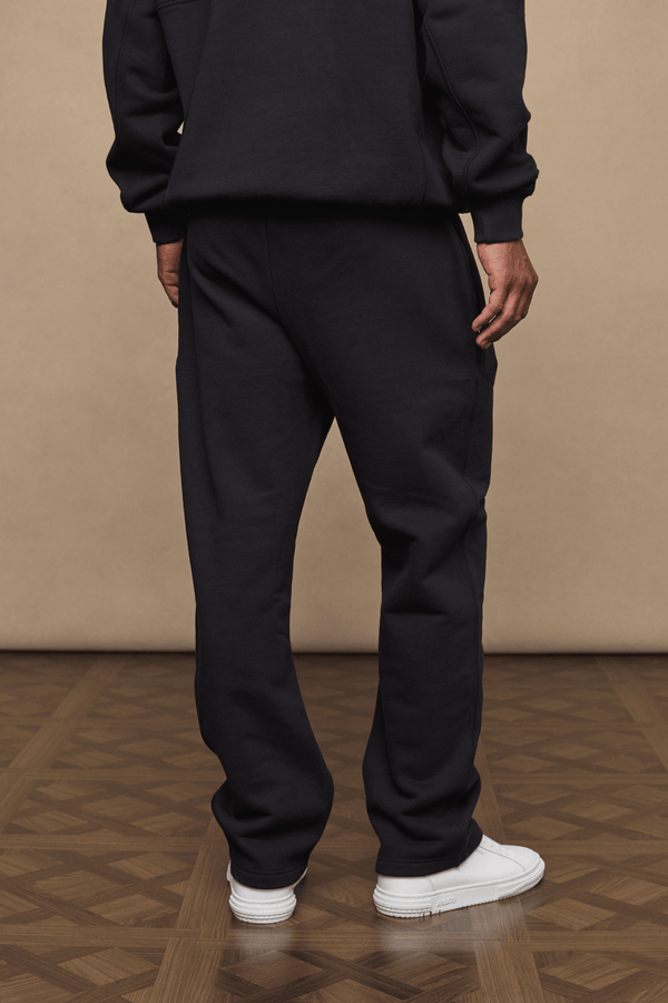 Men’s heavyweight cotton blend joggers in black with straight leg fit by Raith