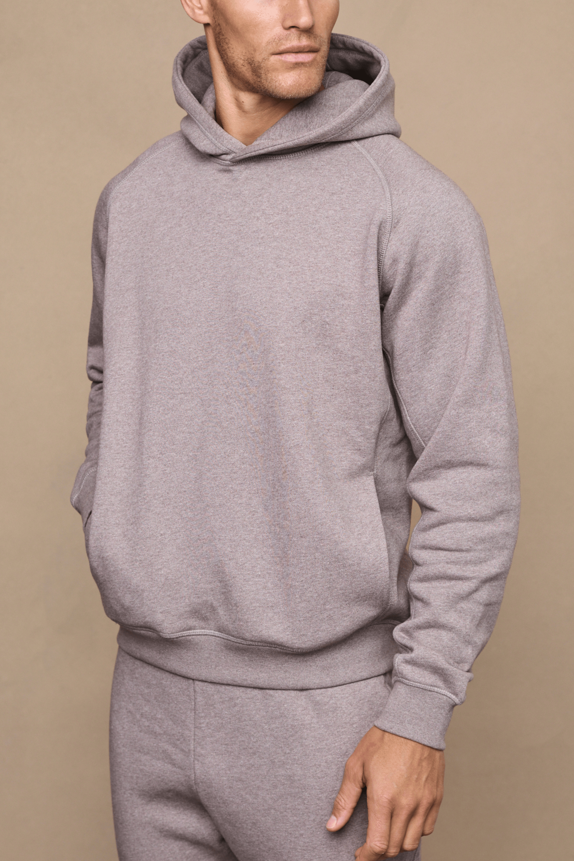 Men’s heavyweight cotton blend hoodie in brown marl with raglan sleeves by Raith
